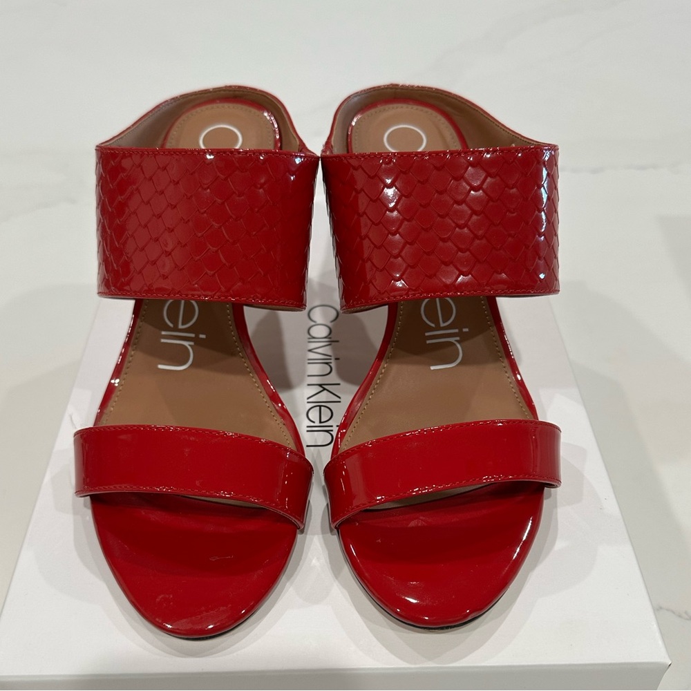 Like new Calvin Klein Cecily red patent pumps